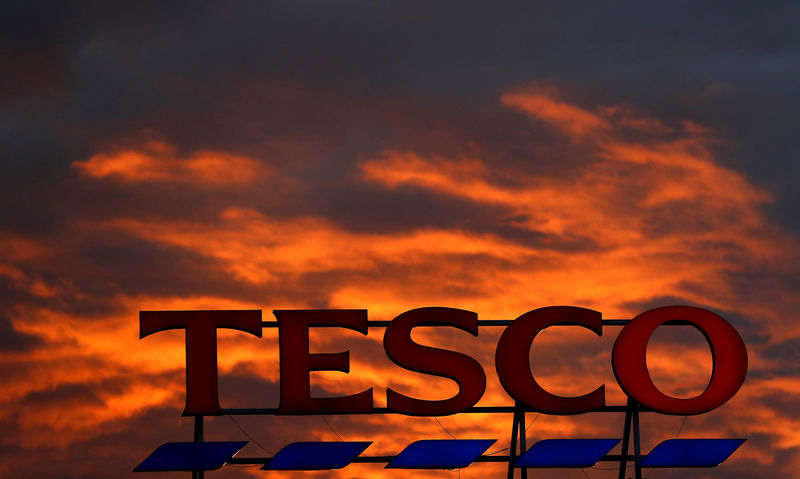 Tesco Falls as Staff Costs Eat up Panic-Buying Gains